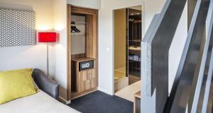 TV a/nebo společenská místnost v ubytování Best Western Hotel Atrium Valence