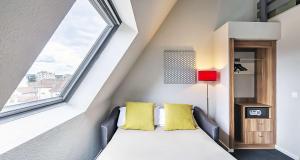 Postel nebo postele na pokoji v ubytování Best Western Hotel Atrium Valence