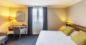 Postel nebo postele na pokoji v ubytování Best Western Hotel Atrium Valence