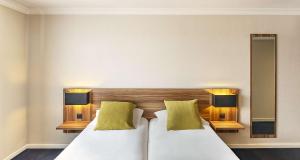 Postel nebo postele na pokoji v ubytování Best Western Hotel Atrium Valence