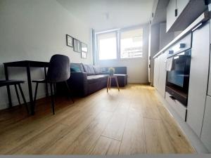 Kuchyňa alebo kuchynka v ubytovaní NeoApartments Lotnicza