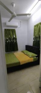 Ένα ή περισσότερα κρεβάτια σε δωμάτιο στο Saaidah Homestay