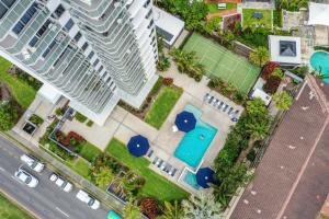 an aerial view of a apartment complex with a swimming pool at Boulevard Towers on Broadbeach in Gold Coast