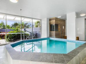 a swimming pool in a house at Boulevard Towers on Broadbeach in Gold Coast