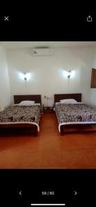 Ένα ή περισσότερα κρεβάτια σε δωμάτιο στο Puri Bebengan Bungalows