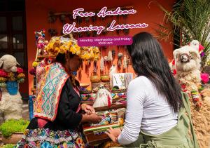 two women are standing in front of a store at Union Hotel Cusco in Cusco
