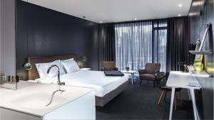 Un pat sau paturi într-o cameră la Van der Valk Hotel Sassenheim - Leiden +110 fotografii