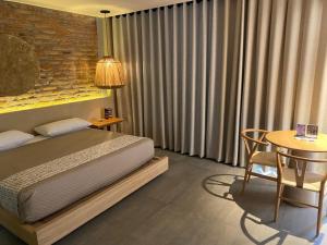 Postel nebo postele na pokoji v ubytování Motel London