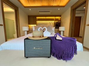 Ein Bett oder Betten in einem Zimmer der Unterkunft Luxtalay Khanom Hotel