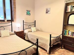 Postel nebo postele na pokoji v ubytování Holiday Home in Sicily near Mount Etna