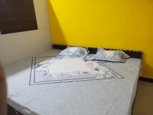 Katil atau katil-katil dalam bilik di Kanikaa home stay
