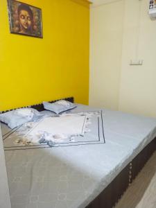Katil atau katil-katil dalam bilik di Kanikaa home stay