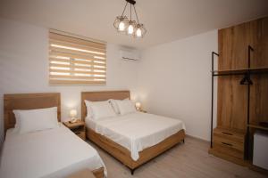 Letto o letti in una camera di Serenity