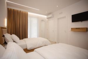 Letto o letti in una camera di Serenity