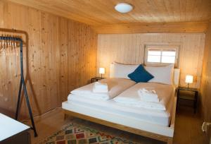 Postel nebo postele na pokoji v ubytování Tech-Free Haven - Acla Sissi - Lenzerheide