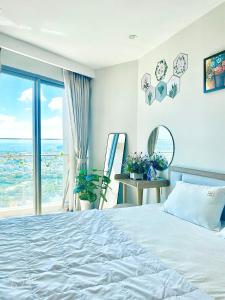 Postel nebo postele na pokoji v ubytování THE SÓNG Căn Hộ 5 Sao Vũng Tàu - Mỹ Duyên + 263 fotografií