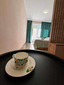 Postel nebo postele na pokoji v ubytování Green House in Tskaltubo