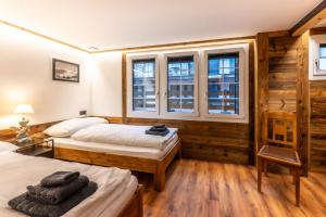 Postel nebo postele na pokoji v ubytování Village Center Apartment Kanne