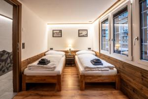 Postel nebo postele na pokoji v ubytování Village Center Apartment Kanne