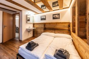 Postel nebo postele na pokoji v ubytování Village Center Apartment Kanne