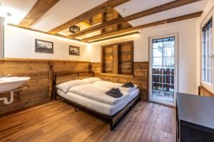 Postel nebo postele na pokoji v ubytování Village Center Apartment Kanne