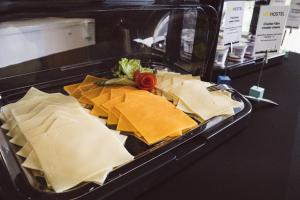 a tray of food on a display in a store at NeoHostel in Berlin +40 photos