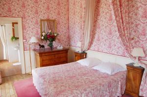 Katil atau katil-katil dalam bilik di Chateau d'Yseron