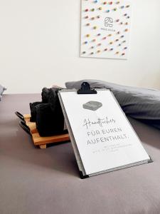 Postel nebo postele na pokoji v ubytování Nerd Room - Gästezimmer in alter Garage