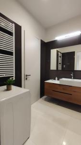 Posteľ alebo postele v izbe v ubytovaní Skiper Apartments & Golf Resort