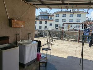 Balkón nebo terasa v ubytování Lijiang Adventure Inn