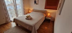 Postel nebo postele na pokoji v ubytování Apartment Lucas