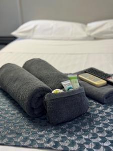 Postel nebo postele na pokoji v ubytování Clermont Hotel Motel