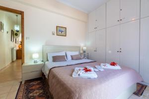 Postel nebo postele na pokoji v ubytování Doris House by GuestCorfu