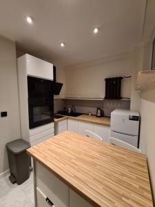 Kuchyňa alebo kuchynka v ubytovaní Apartament lazurowy