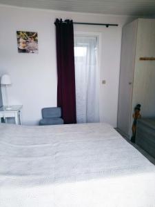 Ένα ή περισσότερα κρεβάτια σε δωμάτιο στο Gîte 2 pers dans havre de paix cévenol