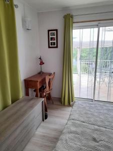 Ένα ή περισσότερα κρεβάτια σε δωμάτιο στο Gîte 2 pers dans havre de paix cévenol