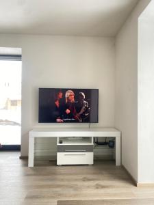 Μια τηλεόραση ή/και κέντρο ψυχαγωγίας στο Apartmány Krymlov