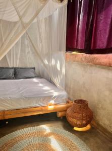 Ένα ή περισσότερα κρεβάτια σε δωμάτιο στο Vertical House Bali