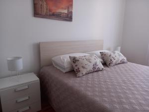 Postel nebo postele na pokoji v ubytování Apartman Martina