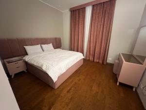 Ένα ή περισσότερα κρεβάτια σε δωμάτιο στο Luxury stay +19 φωτογραφίες