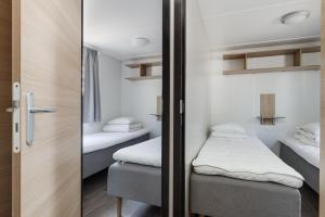 Ένα ή περισσότερα κρεβάτια σε δωμάτιο στο Furuvik Havshotell
