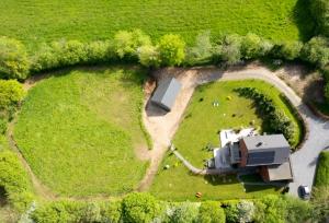 an aerial view of a house in a field at Fredhousedurbuy 1 in Durbuy