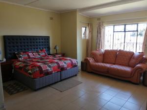 Krevet ili kreveti u jedinici u okviru objekta Mabwe Guest House