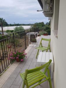 A balcony or terrace at Un passo dal mare - Guest House