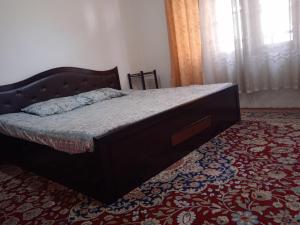 Letto o letti in una camera di Mir manzil