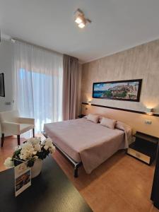מיטה או מיטות בחדר ב-Villa Fenice Bed & Breakfast