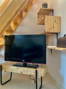 Μια τηλεόραση ή/και κέντρο ψυχαγωγίας στο Cozy Apartament