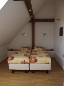 Postel nebo postele na pokoji v ubytování Camping & Guest House Pliskovice