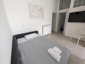a bedroom with a bed with two white pillows on it at Louis House ad Agerola per Amalfi Positano Pompei in Agerola