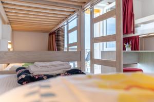 Postel nebo postele na pokoji v ubytování Hostel Casa La Cha